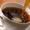 Tea being poured into a cup